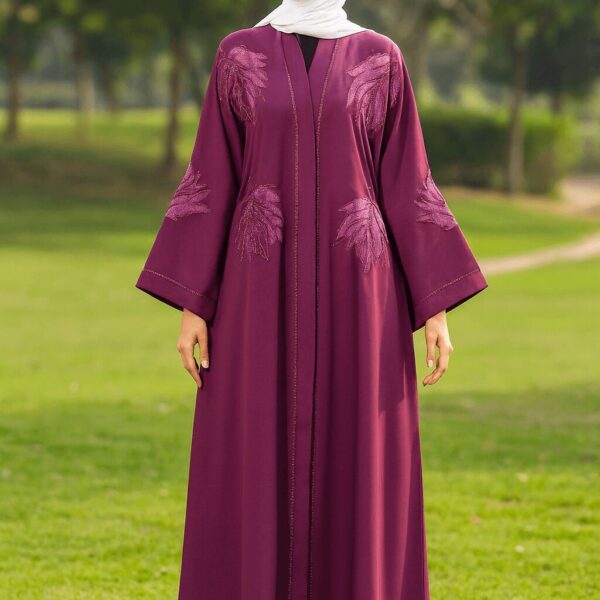 Elegant purple hijab abaya with embroidered leaf patterns for modest fashion wear.