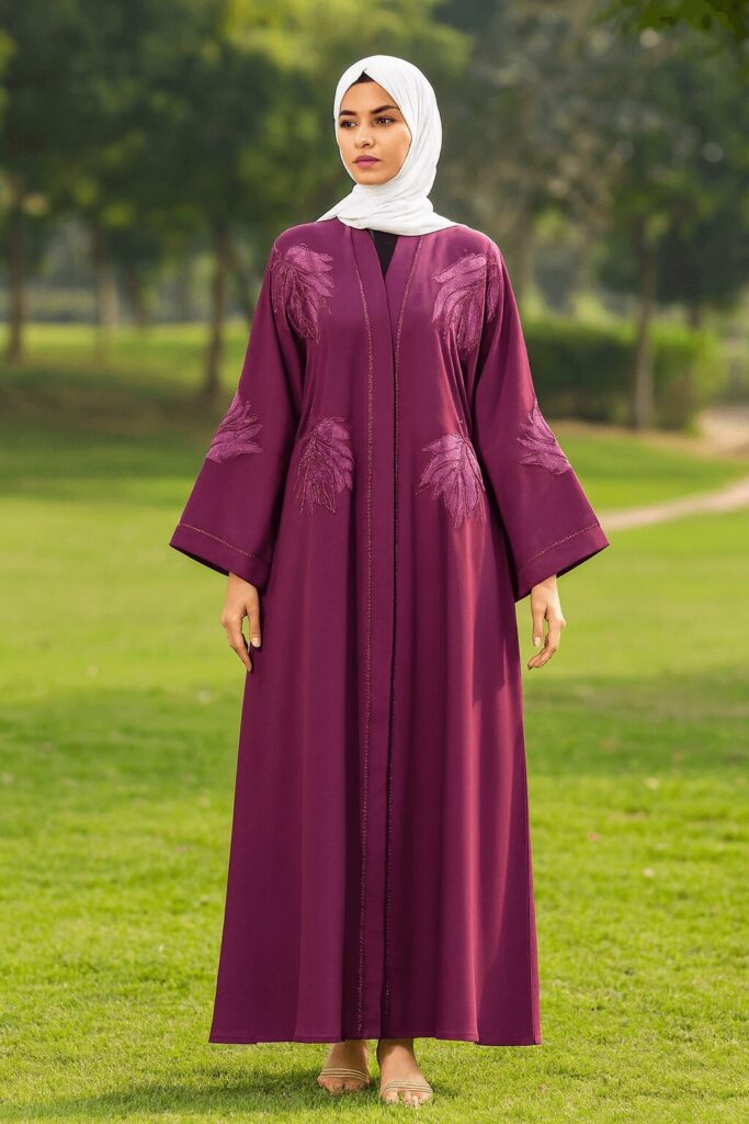 Elegant purple hijab abaya with embroidered leaf patterns for modest fashion wear.