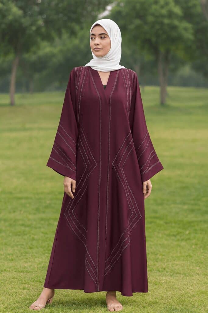 Elegant maroon abaya with silver embroidery, perfect for modest fashion and Muslim women.