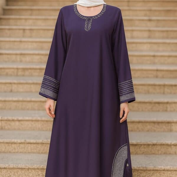 Elegant purple abaya with intricate beadwork, perfect for modest fashion and Islamic attire.