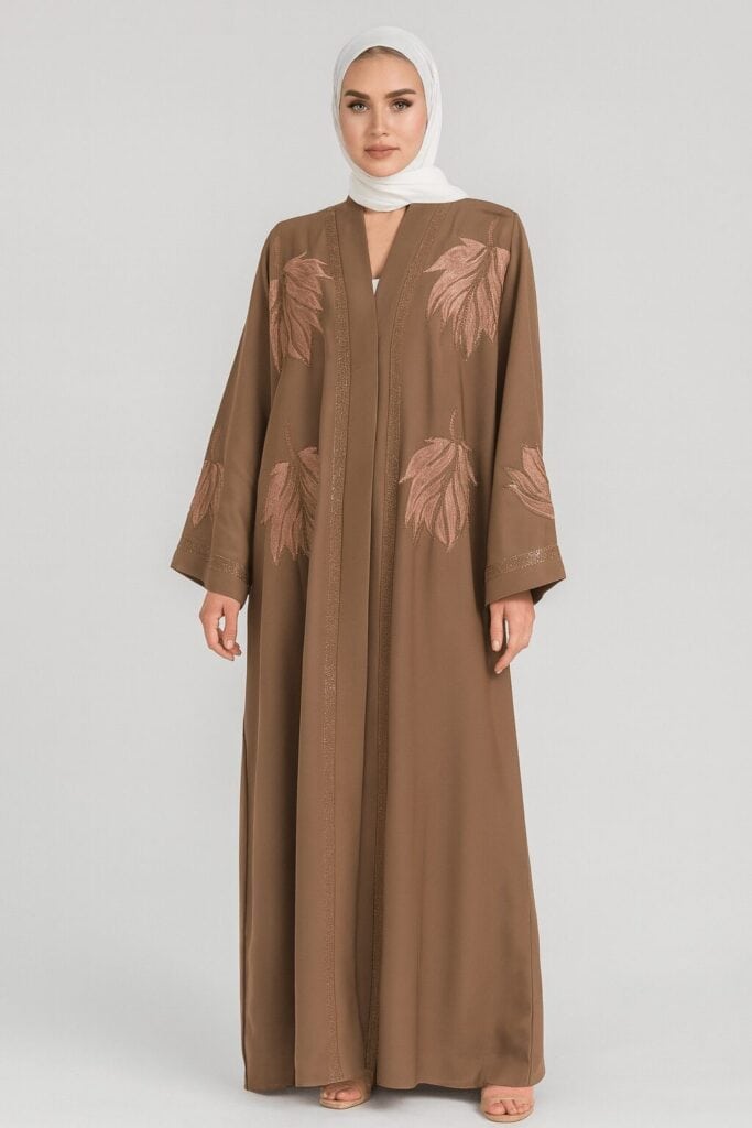 Elegant brown embroidered modest abaya with leaf patterns, perfect for religious and cultural events.