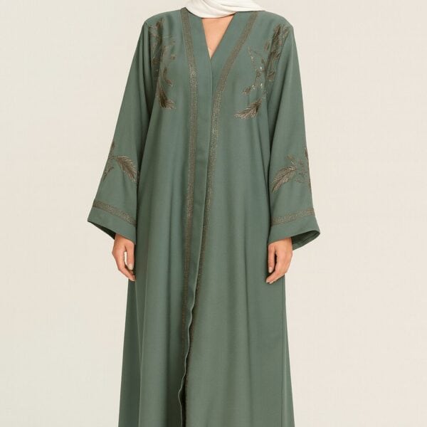 Soft green hijab dress with gold embroidery, modest style for Islamic fashion.